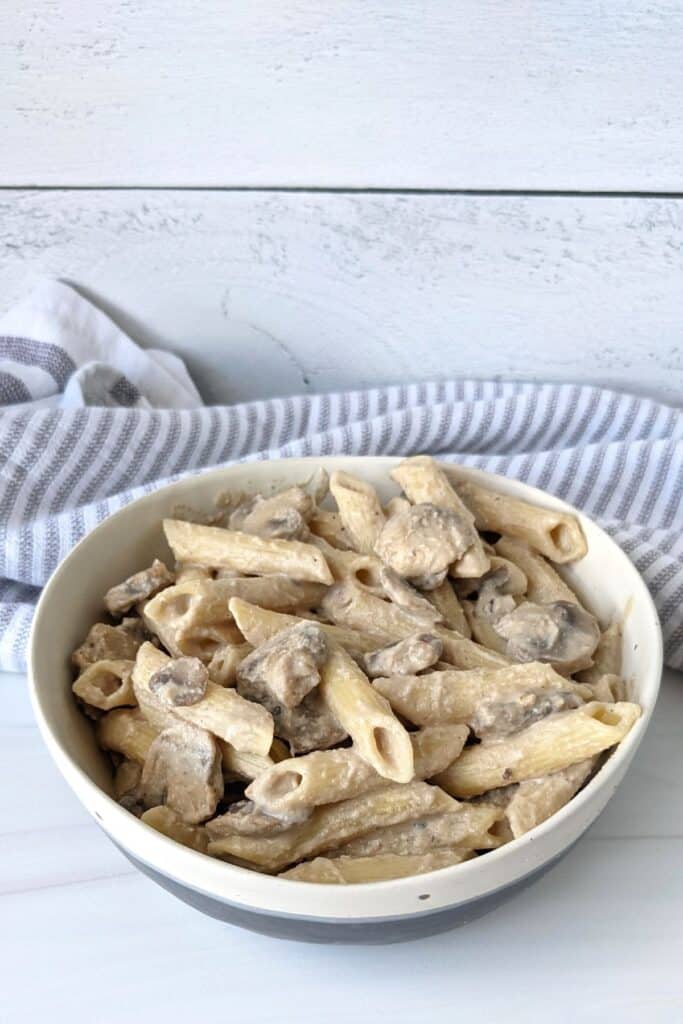 Easy vegan mushroom stroganoff done in 20 minutes, oil free, and high in protein. For 660 calories you get over 30 g plant based protein!