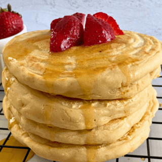 Easy vegan protein pancake recipe. Super fluffy high protein vegan treat with no egg, no dairy, no sugar, and low fat.